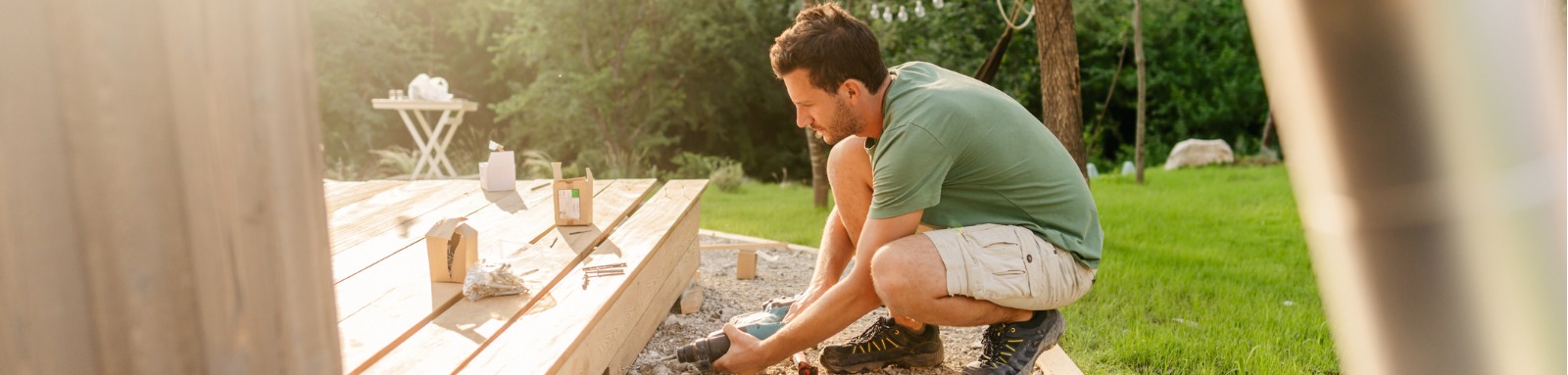 Carpenter installing decking boards