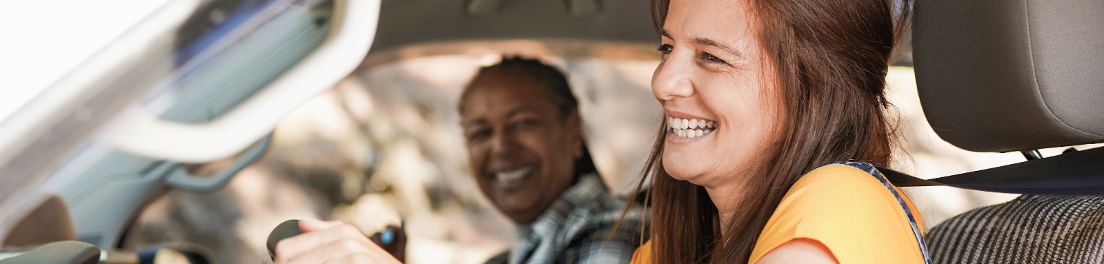 two women on a road trip with camper van